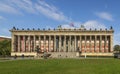 The facade of the Altes Museum and the Lustgarten garden in Berlin, Germany on a beautiful sunny day