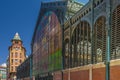 Facade of the Atarazanas food market and Sagasta building in Malaga, Spain Royalty Free Stock Photo