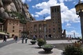 Facade of the Basilica of Montserrat Monastery. Tourists in front of the basilica.