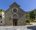 The facade of the beautiful Church of San Lorenzo in Manarola, Cinque Terre, Liguria, Italy