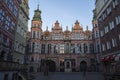 The facade of the beautiful historic building on the narrow street of the Old Town of Gdansk. Poland Royalty Free Stock Photo