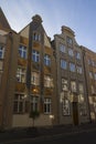 The facade of the beautiful historic building on the street of the Old Town of Gdansk. Poland Royalty Free Stock Photo