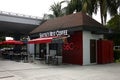 Facade of a branch of a popular coffee place in the premises of an airport in Manila, Philippines