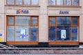 Facade of a branch of Promsvyazbank - PSB with an illuminated sign