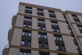 Facade of a brown building.