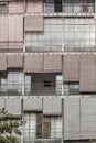 Facade building, balconies, sliding curtains in Raval quarter of Barcelona.