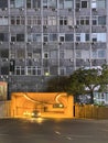 Facade of a building in Belgrade with street lights, a road tunnel under the building. Belgrade, Serbia - 2022, May 2. Royalty Free Stock Photo