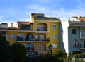 Facade building in colorfull. Residential building with balconies and windows.