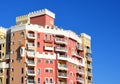 Facade building in colorfull. Residential building with balconies and windows.