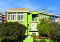 Facade building in colorfull. Residential building with balconies and windows.