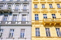 Facade of building with different colors. Yellow and gray.