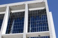 The facade of the building with large blue glass, high-rise building, office. Royalty Free Stock Photo