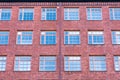 Facade of the building with large lattice windows