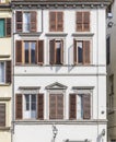 The facade of a building in one of the streets in Florence