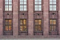 Facade made of red granite. Royalty Free Stock Photo