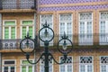Facade of the building in Porto, Portuglia, decorated with multi-colored ceramic tiles azulejo
