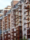 Facade of building under construction in scaffolding. Royalty Free Stock Photo