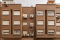 Facade of a building with windows with shutters Royalty Free Stock Photo