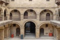 Facade of caravansary of Bazaraa, with vaulted arcades and windows covered by interleaved wooden grids mashrabiyya, Cairo, Egypt