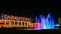 Facade of the Casino Estoril with colourful fountain show at night. Casino Estoril is one of the largest casinos in Royalty Free Stock Photo