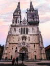 Facade of Cathedral of Zagreb on sunset sky background in Zagreb, Croatia