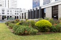 The facade of the Central Bank (Banco Central) of Costa Rica, with Los Presentes, a 1982 bronze sculpture