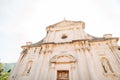 Facade of the Church of the Nativity of the Virgin with columns and statues. Prcanj