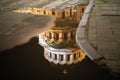 Facade of a church reflected in a puddle Royalty Free Stock Photo