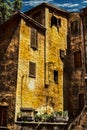 Colorful building with closed shutters in Rome