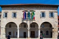 Facade of Communal Palace, used as City Hall, in Forum Square in Pula, Croatia