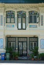 Facade of a conserved pre-war terrace house designed in Chinese Baroque style with neo-classical & Peranakan features, Petain Road