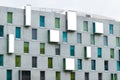 Facade of the contemporary, Art Otel in the city of Cologne, Germany, Green, blue and turquoise coloured windows