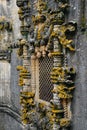 Facade of the Convent of Christ with its famous intricate Manueline window in medieval Templar castle in Tomar, Portugal