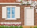 Brick facade with window fence tulips