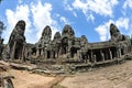 Facade and courtyard of Bayon Temple in Cambodia Royalty Free Stock Photo