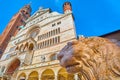 The facade Cremona Cathedral behind the stone lion\'s head, Italy Royalty Free Stock Photo
