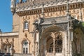 Facade detail of the Palace of Bucaco with garden in Portugal. Palace was built in Neo Manueline style between 1888 and 1907. Luso