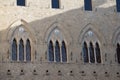 Facade detail of the Salimbeni Palace, Banca Monte dei Paschi di Siena. Siena, Tuscany, Italy. Royalty Free Stock Photo