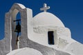 Facade detail of the traditional greek chapel with white plastered walls Royalty Free Stock Photo