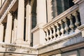 Facade details, columns of beautiful old European stone building. European architecture in Renaissance style. Royalty Free Stock Photo