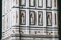 Facade details of Giotto campanile at night in Florence, Italy