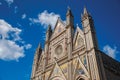 Facade details of the opulent and monumental Orvieto Cathedral in Orvieto.