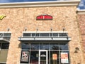 Facade entrance to Papa John`s American pizza restaurant chain blue sky Royalty Free Stock Photo