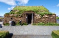 The facade and the entrance to traditional Icelandic turf house with grass roof in Modrudalur farm settlement in Eastern Island Royalty Free Stock Photo