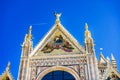 Facade Exterior Christ Crowning Mary Cathedral Church Siena Italy.