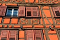 Facade of fachwerkhaus, or timber framing, in Riquewihr village, Alsace, France