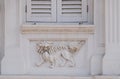 Close-up of Qi Lin Chinese `unicorn` decorative plaster motif facade of Singapore Straits Chinese or Peranakan shop house