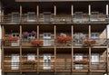 Facade with flowers, Cortina dAmpezzo, Italy Royalty Free Stock Photo