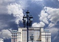 Facade of Four Seasons hotel Hotel Moskva from Manege Square on a cloud background. Moscow, Russia