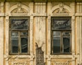 Facade fragment of an abandoned old house